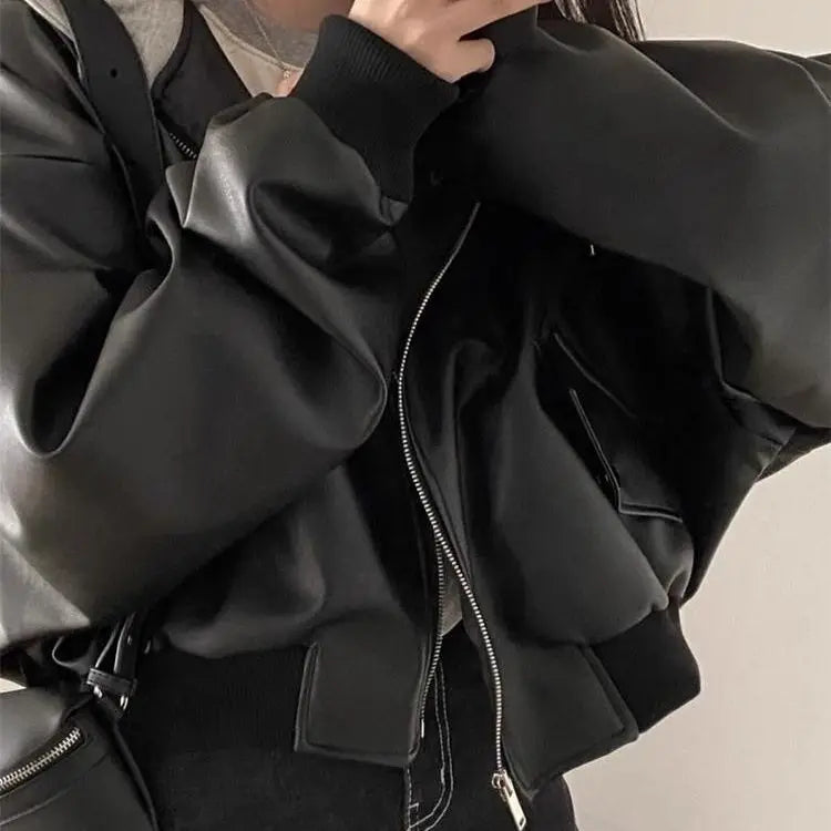 Chaqueta coreana de cuero PU negro de gama alta para mujer, moda holgada con capucha para primavera y otoño, ropa de abrigo versátil falsa de dos piezas con cremallera