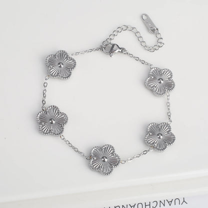 Pulsera clásica de acero inoxidable para mujer, brazalete ajustable de cinco flores, joyería de fiesta a la moda.