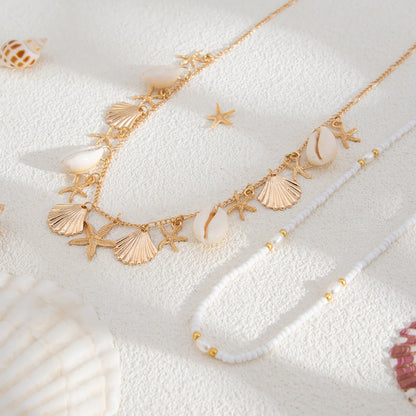 Cadena corporal de conchas marinas con dijes de estrella de mar y perlas, joyería de cintura bohemia ajustable, accesorio para festivales de playa para mujer.
