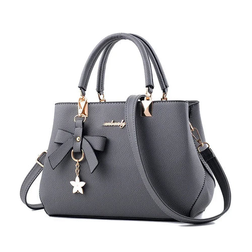 Bolsos de mensajero para mujer con colgante de flor, bolsos de moda para oficina para mujer, bolso puro para mujer, nuevos bolsos de hombro tipo bandolera