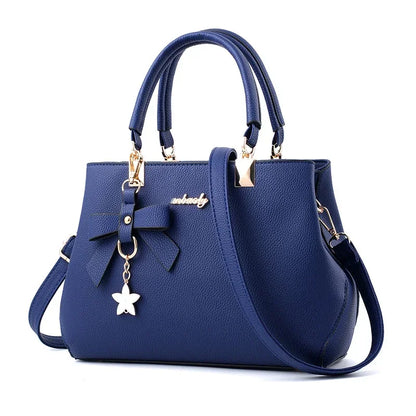Bolsos de mensajero para mujer con colgante de flor, bolsos de moda para oficina para mujer, bolso puro para mujer, nuevos bolsos de hombro tipo bandolera